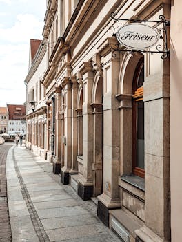 A picturesque cobblestone street in Pirna, Saxony, showcasing historic architecture.